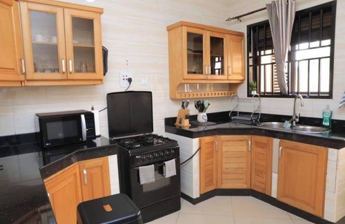 Bukoto Condo | Cozy 3BR, Fast WiFi, Near Metroplex Mall, Parking