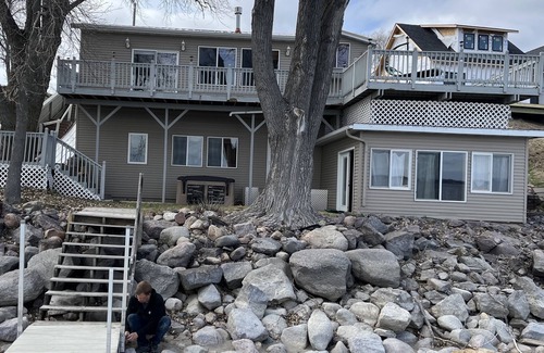 Hamlin County Cabin | Cozy beach front lake cabin with hot tub!