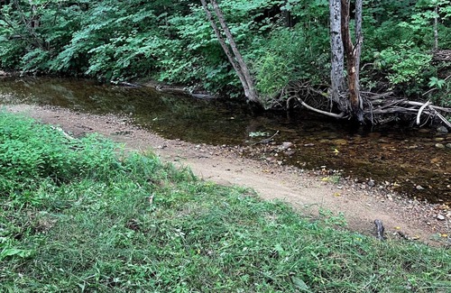 Bartlett RV Rental | Cozy brookside campsite 3