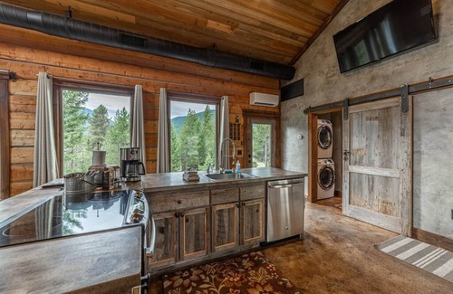 Coram Cabin | Cozy cabin outside Glacier National Park. Private hot tub + pet-friendly!