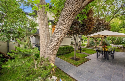 Mount Royal Cottage | Cozy Cliff Bungalow Cottage: Inner City Oasis with Home Theater and Parking!