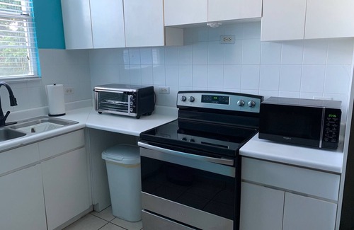 Florencio Condo | Cozy condo in gated community near beaches, shopping, and attractions