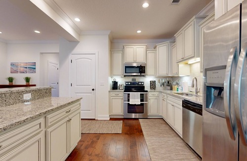 Epworth Acres House | Cozy island townhouse w/screened porch, shared pool, & serene pond views