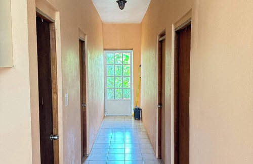 Stella House | Cozy Rincon retreat with classic amenities, steps from beach and dining.