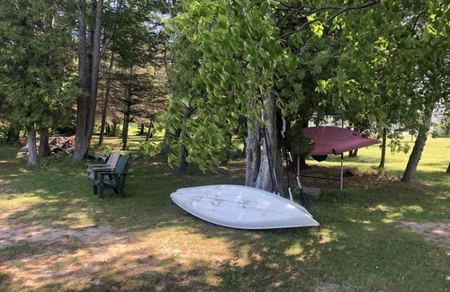 Lake Leelanau Cabin | Cozy waterfront sunset cottage on Lake Leelanau. Air, Near Leland.