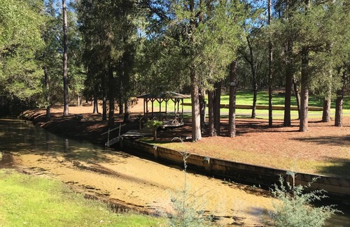 Holt RV Rental | Creek Waterfront Private RV Lot (3 minutes from interstate)