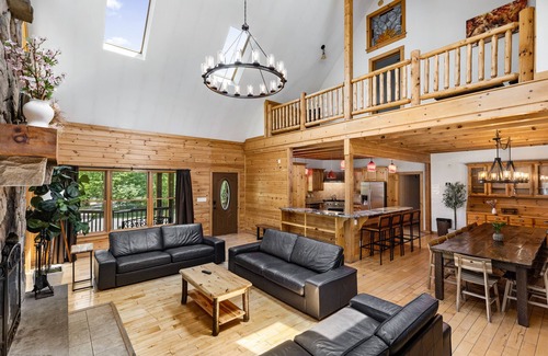 Gouldsboro House | Creekfront Log Mansion With Heated Outdoor Pool and Hot Tub