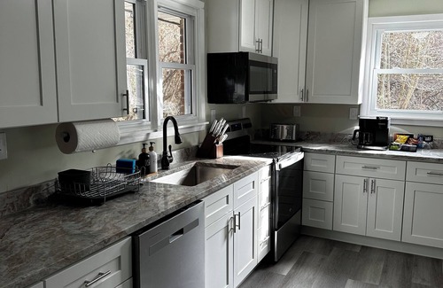 Newcomb House | Creekview retreat by ATV trails and waterfalls! Stunning creek view from porch.