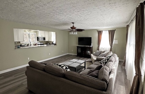 Newcomb House | Creekview retreat by ATV trails and waterfalls! Stunning creek view from porch.