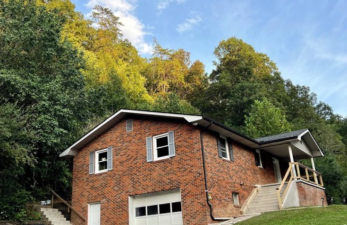 Newcomb House | Creekview retreat by ATV trails and waterfalls! Stunning creek view from porch.