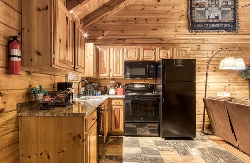 Pigeon Forge Cabin | Cuddlin' Up, Er209 - Luxury At Its Finest And Location That Can't Be Beat! 2 Bedroom Cabin by RedAwning