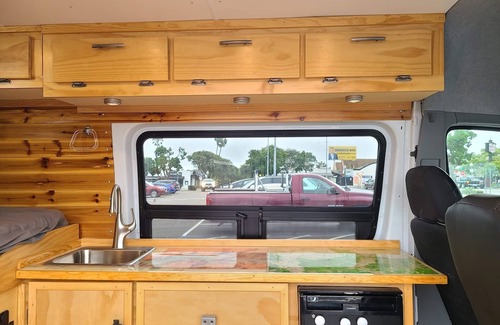 Loma Portal House | Custom Build ECO Friendly High-top Sprinter Camper Van (Drivable)