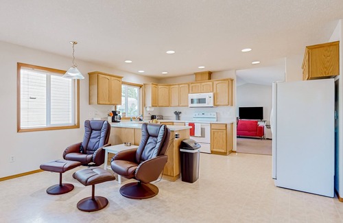 Gresham House | Custom-built home alongside greenspace with deck & massage chairs