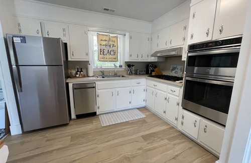 Buxton Cottage | Cypress Cove, situated in Buxton on a soundfront lot, provides a peaceful setting in this charming rental cottage.