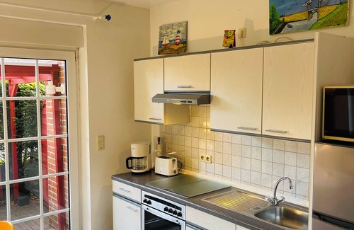 Sturenburgshof House | Dat Friesenhuus 2 for 4 persons in Aurich at the bathing lake! Pet friendly!