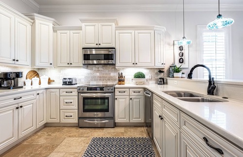 Villa Lago House | Designer Golf Course Beach Home with 2 Golf Carts in gated Resort