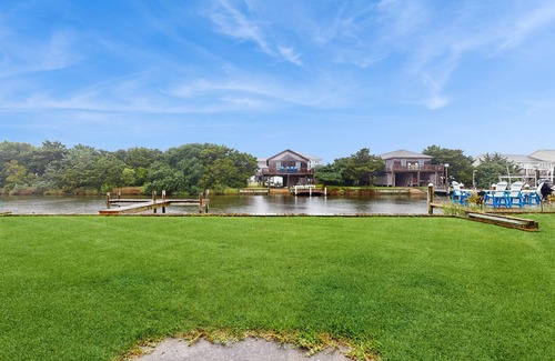 Brigands' Bay House | Dog-friendly, canal-front house with dock, balcony, deck, & central AC
