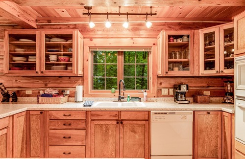 Presque Isle House | Dog-friendly, lakefront home with a wood fireplace, decks, dock, & AC