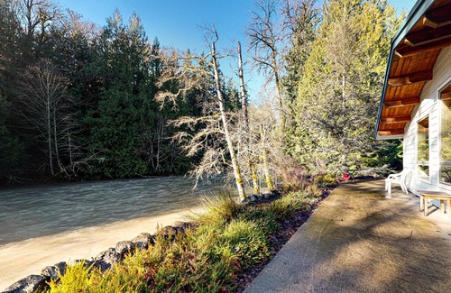 West Hills House | Dog-friendly, riverfront getaway with a wood stove & full kitchen!