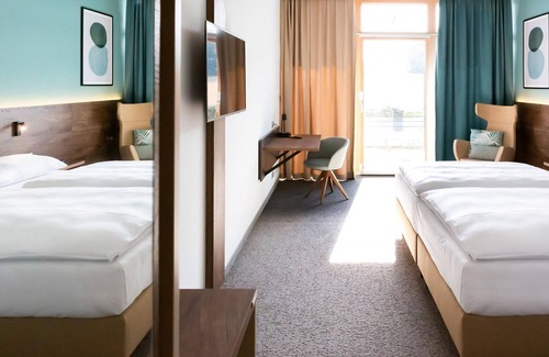 Loipersdorf bei Fuerstenfeld House | Doppelzimmer Superior Deluxe - ab 2 Nächten - Das Sonnreich Loipersdorf