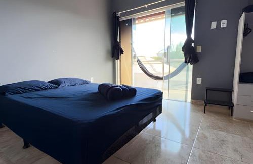 Porto da Roca House | Duplex em Itaúna 4min da Praia que ocorre o WSL, 1min da pista de skate do LS, pracinha com parque infantil, quadra de futebol, tudo isso a 1 min da duplex, perto do comércio, wi-fi super rápido, estacionamento gratuito, monitoramento 24hrs