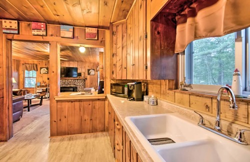 East Tawas House | East Tawas Cabin with Deck, Backyard & Fire Pit!