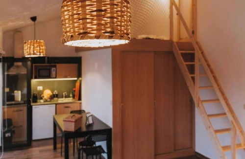 Peso Apartment | Elegant and private, with lawn out front and set back from the pool for added seclusion. Features Marshall speaker, plush robes, handmade herbal bath products and a sommelier-selected wine bottle for an exclusive stay.