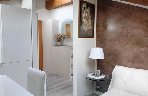 Levico Terme Apartment | Elegant attic with Dolomites view, relaxation and nature in Levico Terme.