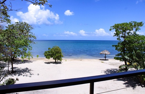 Palmetto Bay Villa | Elegant Custom Beachfront Villa With Floor To Ceiling Glass Walls, 180 Sea-View