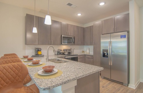Deerwood Apartment | Elegant Mid-Century Modern Apt- Shops+Dining+Beach