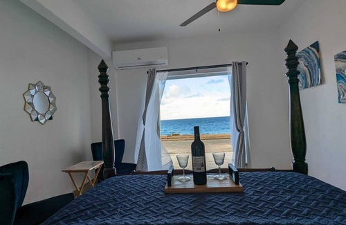 Hato Abajo Apartment | Elegant Ocean-Front Apartment, PRIVATE Jacuzzi, BBQ