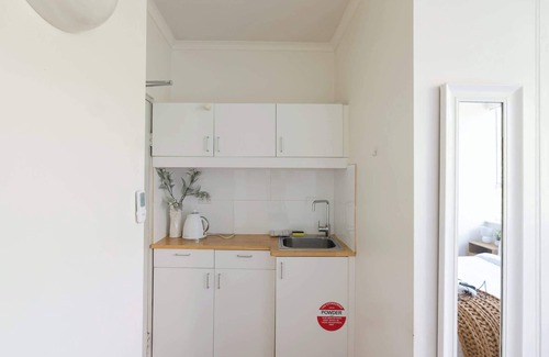 Darling Point Apartment | Elegant Studio with Rooftop Harbour Views