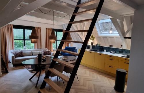 Abdij Apartment | Elysian Yellow Suite