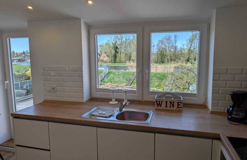 Wolthusen Apartment | Emden - Holiday apartment with canal and field view