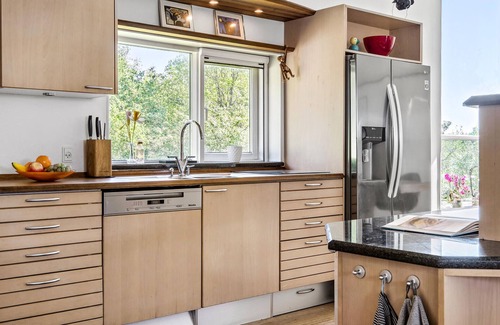 Daugard House | Enjoy a relaxing holiday in this holiday home with sea views near Vejle Fjord.