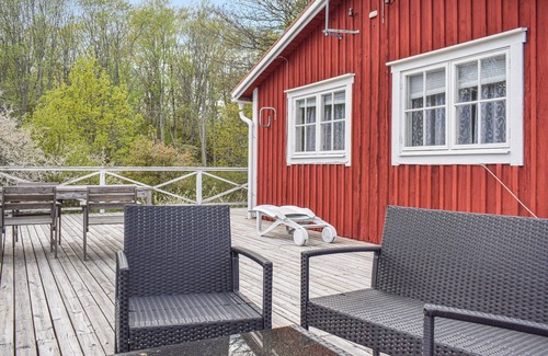 Hjorted House | Enjoy an unforgettable stay in this inviting vacation home with some sea view.