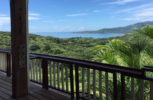 Tejas House | Enjoy ocean views and breezes as you relax in one of the hammocks on the deck