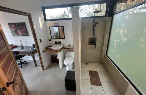 Santa Cruz House | Enjoy privacy and nature in this open concept home and relaxing pool. n