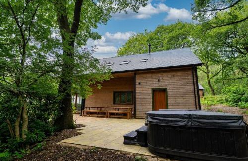Farley House | Errwood, woodland lodge with hot tubs for 14