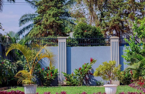 Bukoto House | Escape to Tranquility. A homely place close to everything but hidden from view.