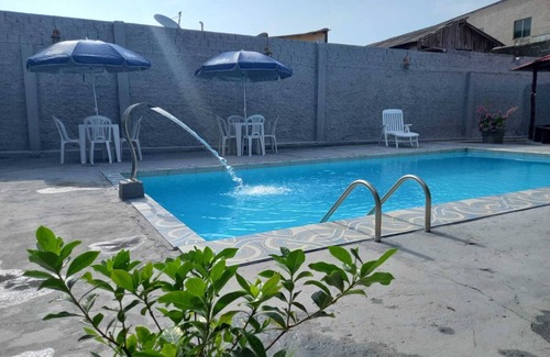 Itacoatiara House | Espaço Itacoatiara - AM Casa Aconchegante em Itacoatiara com Piscina e Cascata