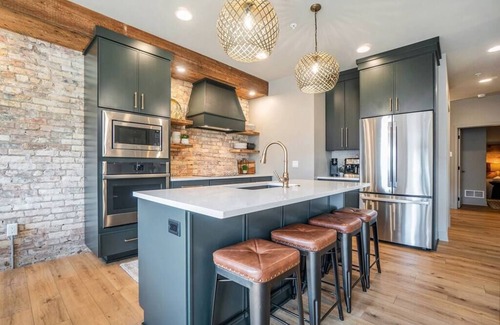 Holland Condo | Evelyn 201: Modern 2-Story Condo with Private Terraces in Downtown Holland