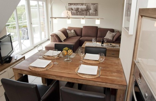 Borkum Apartment | Exclusive 5*FeWo with sea view, roof terrace and gas fireplace.