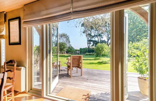 New Forest District Cottage | Experience coastal charm and comfort at Lymington Lodge.