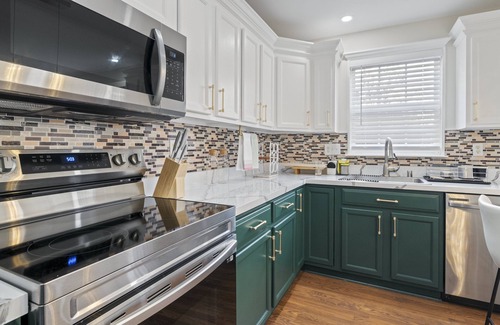 Owings Mills House | Experience Elevated Comfort: Luxe Breeze Townhouse.