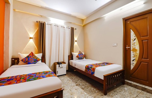Alwaye Hotel | Fabhotel Dreams Paradise Airport Residency