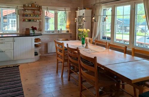 Bjorli House | Family Cabin Cluster By Waterfall In Bjorli