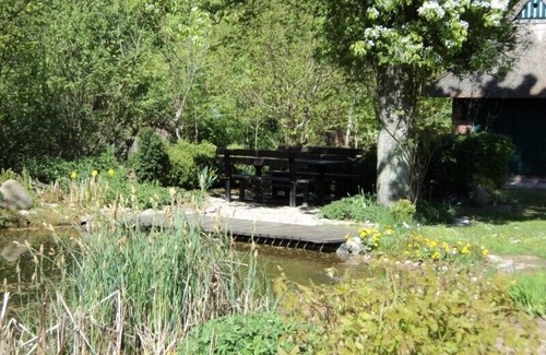 Langenhagen House | Family-friendly apartment in a thatched house, close to the Baltic Sea