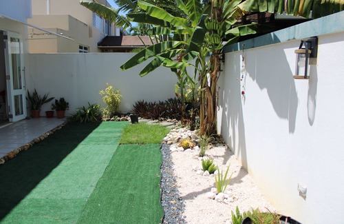 Distrito Central de Bayamon House | Family-Friendly Oasis in Gated Community, Fast Wi-Fi, Pickleball, Free Parking!