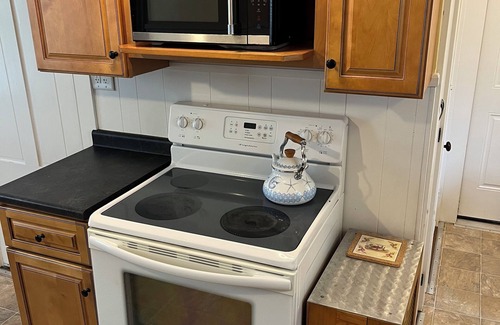 Southern Coast Condo | Family friendly serene house close to beaches, sleeps 8, lot off street parking